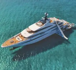 Step-by-step guide to landing your first job on a superyacht, covering essential roles, certifications, and job search tips.