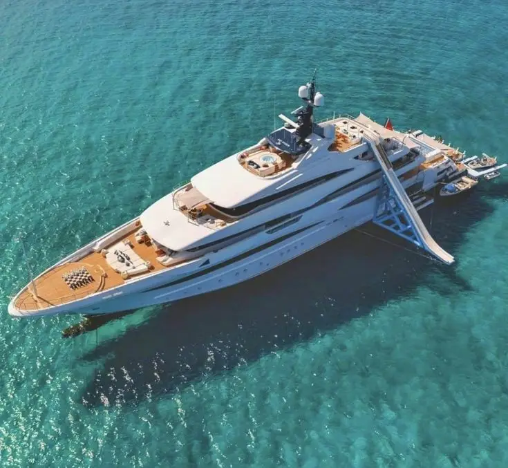 Step-by-step guide to landing your first job on a superyacht, covering essential roles, certifications, and job search tips.