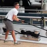 Deckhand trainee using powerboat during superyacht training course in Cape Town
